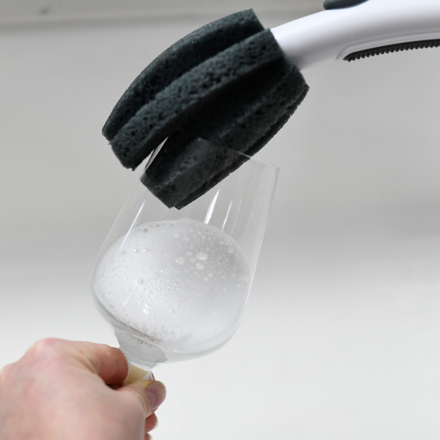 Specially designed sponge to clean the rim of your wine glass